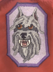 Needlepoint patch of grinning toothy Bouvier, inspired by my bitch Chelsea