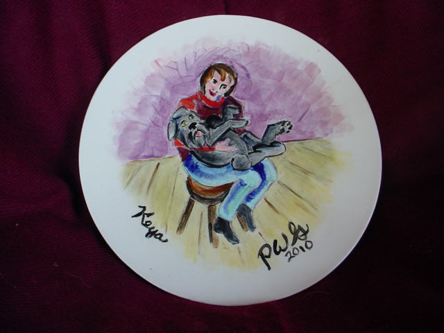 ceramic painting of puppy Keya in Lynn's lap